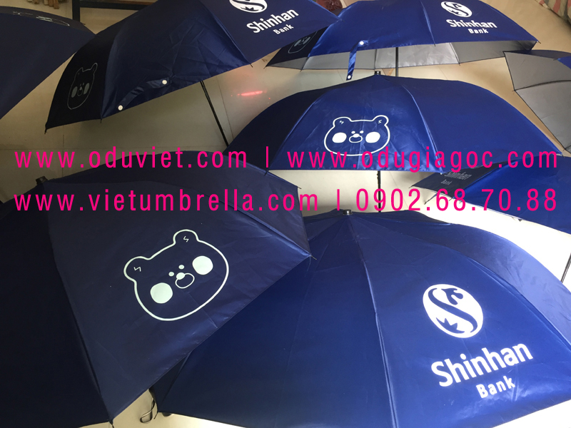 xưởng sản xuất ô dù cầm tay in logo quảng cáo